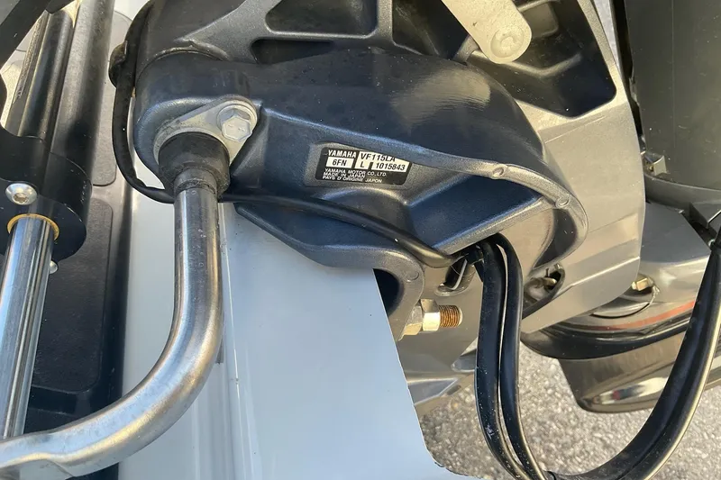Slide: The Image of Close-up of a 2020 Zodiac Pro 5.5 boat engine component with Yamaha branding. - 11