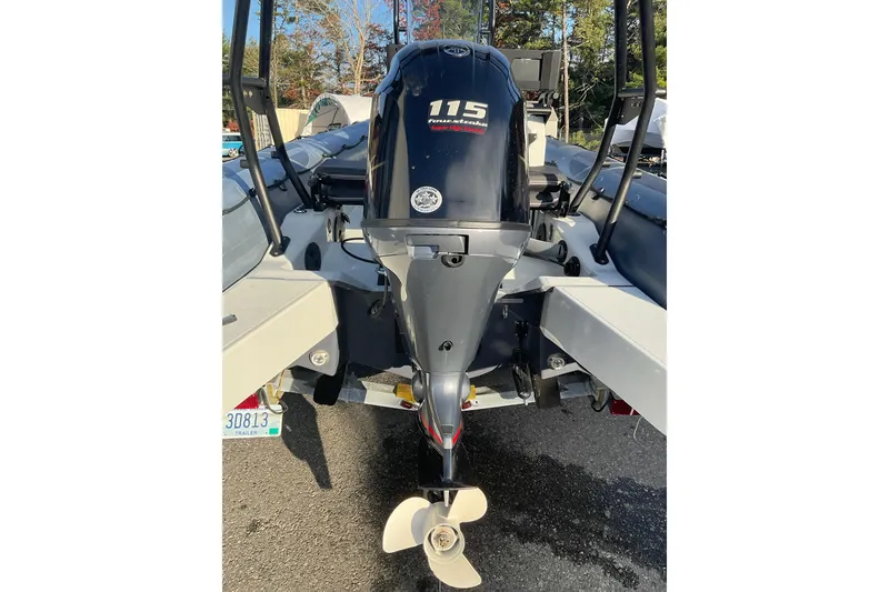 Slide: The Image of Zodiac Pro 5.5 boat, 2020 model, featuring a 115 horsepower outboard motor. - 8