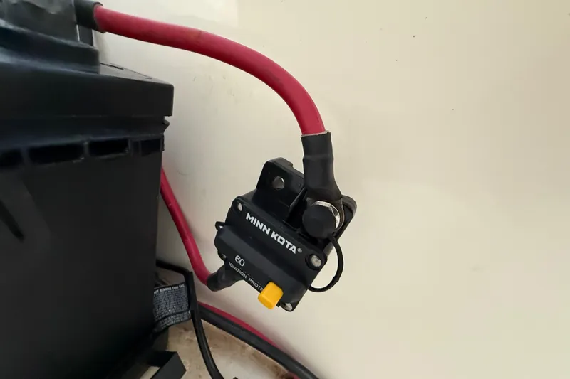 Slide: The Image of 2023 Mako Pro Skiff 15 CC boat battery setup with NOCO Genius charger. - 36