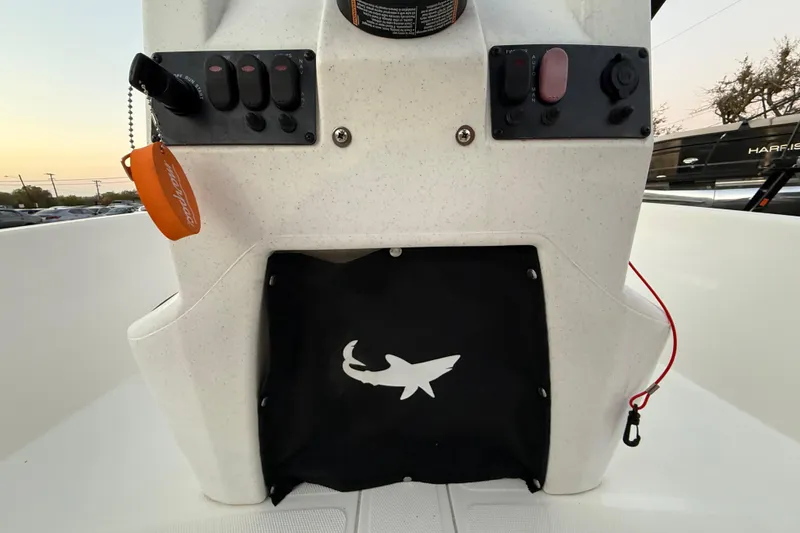 Slide: The Image of 2023 Mako Pro Skiff 15 CC interior compartment with wiring and footrest. - 41