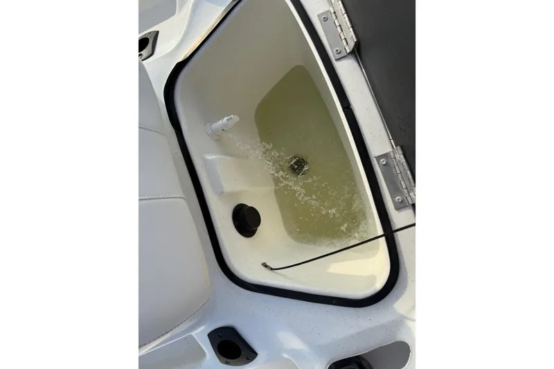 Slide: The Image of 2023 Mako Pro Skiff 15 CC boat with Mercury engine at dockside. - 75