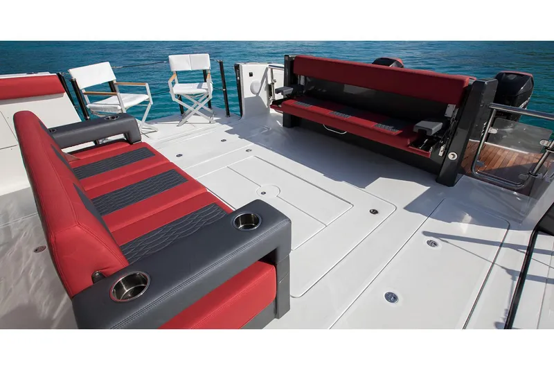 Slide: The Image of Manufacturer Provided Image: Spacious deck of 2020 Ocean Alexander 45 Divergence Sport yacht with red and black seating. - 20