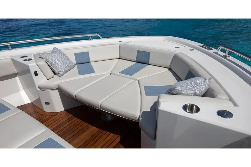 Slide: The Image of Manufacturer Provided Image: 2020 Ocean Alexander 45 Divergence Sport boat seating area with cushions and pillows. - 8