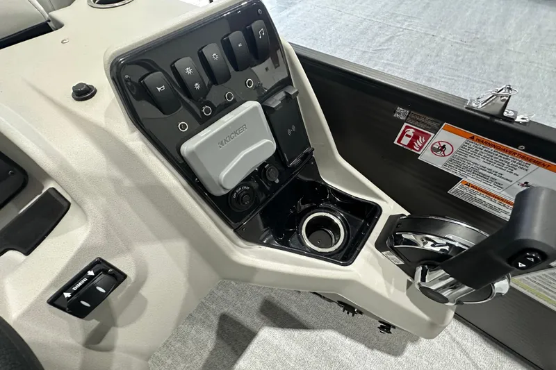 Slide: The Image of Control panel of 2026 Princecraft Vectra 23 RL boat with switches and throttle. - 10