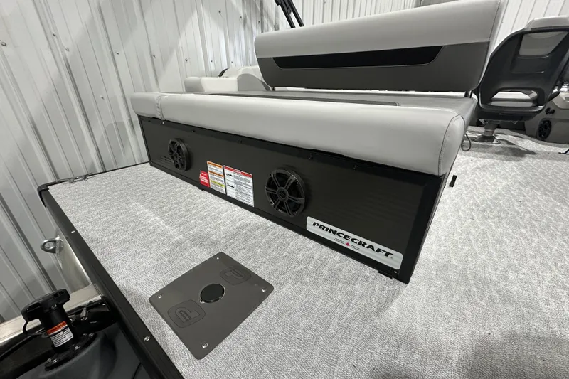 Slide: The Image of 2026 Princecraft Vectra 23 RL boat interior with seating and speaker system. - 4