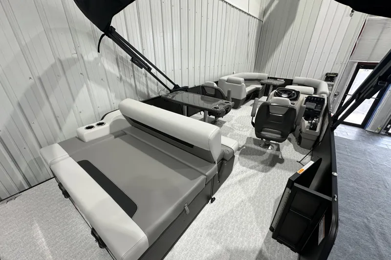 Slide: The Image of 2026 Princecraft Vectra 23 RL pontoon boat interior with modern seating and helm. - 5