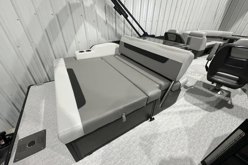 Slide: The Image of 2026 Princecraft Vectra 23 RL boat interior with gray seating and cup holders. - 6
