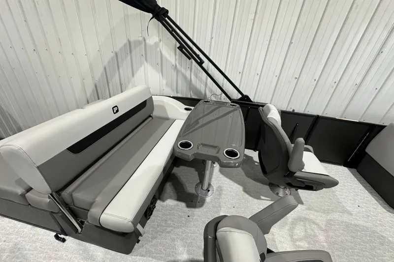 Slide: The Image of 2026 Princecraft Vectra 23 RL boat interior with seating and table setup. - 7