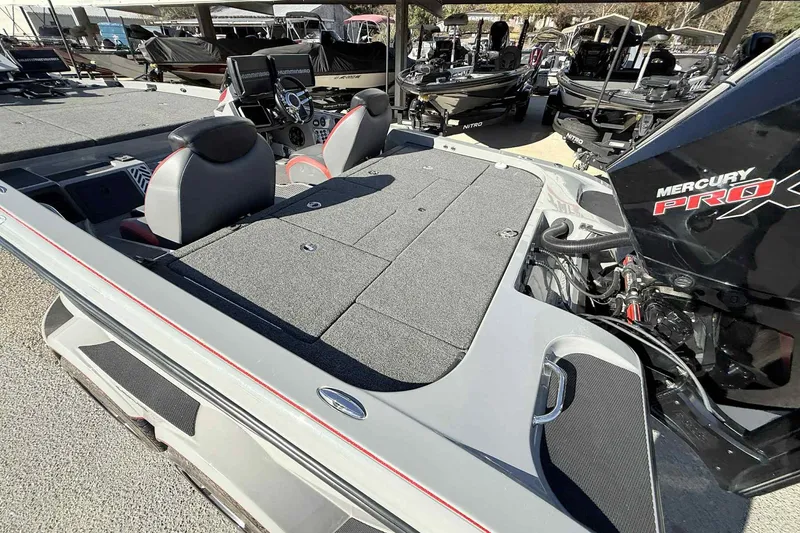 Slide: The Image of 2022 Caymas CX20PRO boat with Mercury Pro XS engine, featuring spacious deck and dual seats. - 10