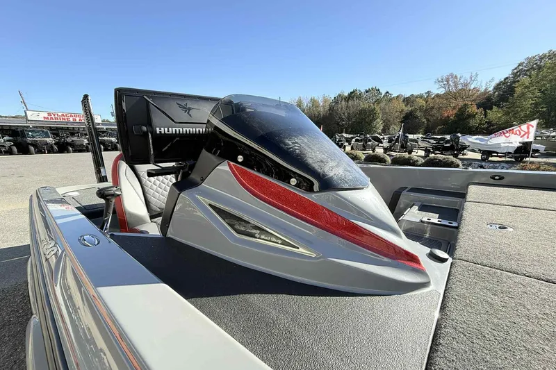 Slide: The Image of 2022 Caymas CX20PRO boat with sleek design and advanced navigation equipment. - 12