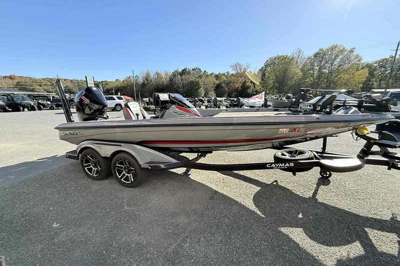 Slide: The Image of 2022 Caymas CX20PRO boat on trailer in outdoor setting. - 2