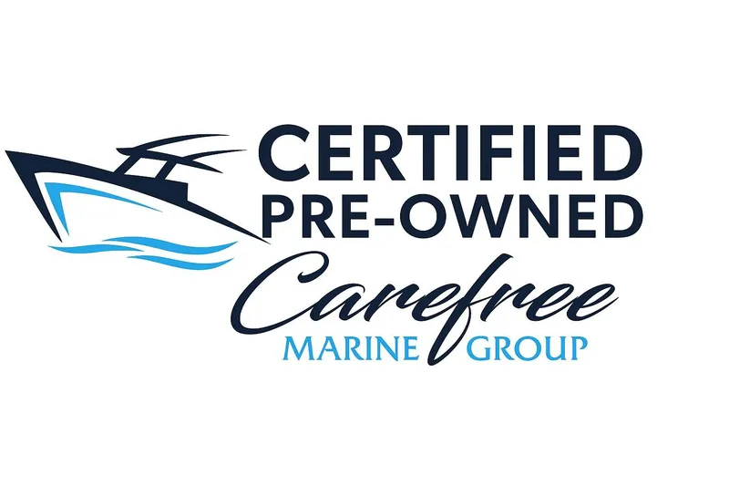 Slide: The Image of Certified pre-owned Carefree Marine Group logo with boat graphic. Cobia 262 Center Console 2021. - 2