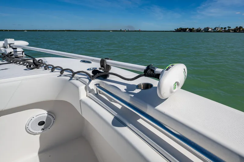 Slide: The Image of 2021 Invincible 40 Catamaran bow with trolling motor on calm water. - 22
