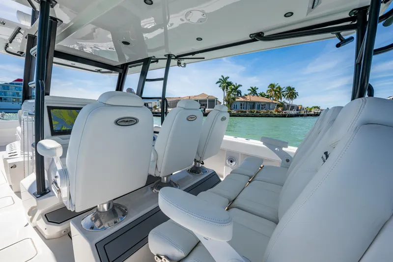 Slide: The Image of Interior of 2021 Invincible 40 Catamaran with luxurious seating and waterfront view. - 52