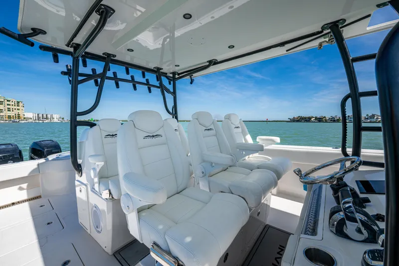 Slide: The Image of Luxurious interior of 2021 Invincible 40 Catamaran with white seating and ocean view. - 54