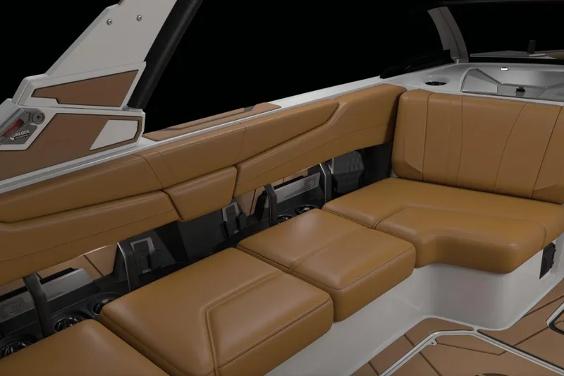 Slide: The Image of 2026 Malibu Wakesetter 21 LX interior with luxurious tan leather seating. - 12