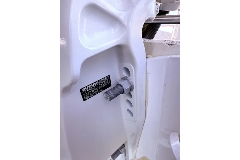 Slide: The Image of Close-up of a Suzuki motor mount on a 2001 Carolina Skiff 1980 V boat. - 9