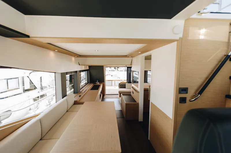 Slide: The Image of Luxurious interior of 2024 Beneteau Grand Trawler 62 yacht, featuring modern design and spacious layout. - 10