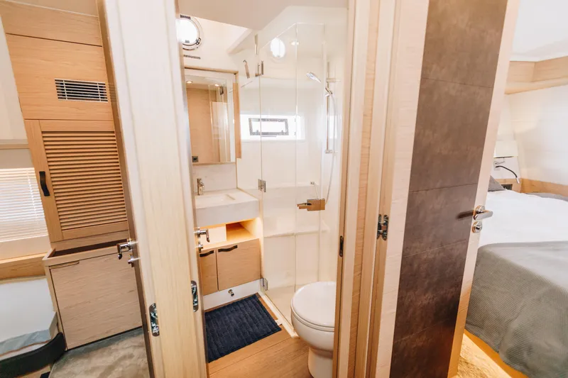 Slide: The Image of Luxurious bathroom interior of 2024 Beneteau Grand Trawler 62 yacht. - 47