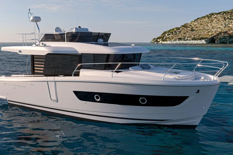 Slide: The Image of 2026 Beneteau Swift Trawler 37 Fly on serene ocean near rocky coastline. - 20