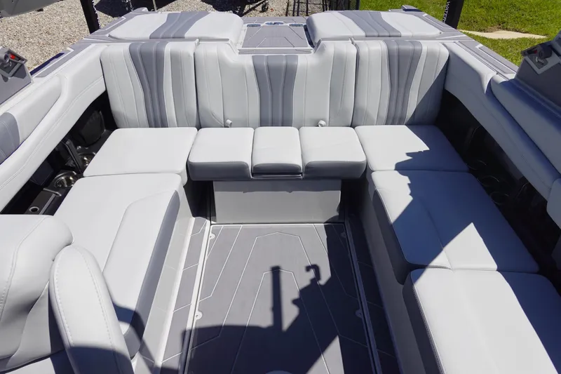 Slide: The Image of 2026 Malibu Wakesetter 22 LSV interior with luxurious gray seating arrangement. - 12