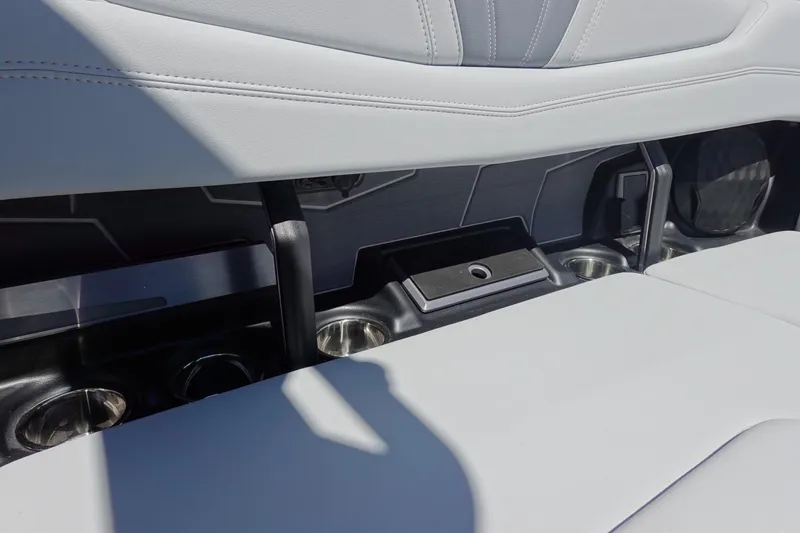 Slide: The Image of Interior seating of 2026 Malibu Wakesetter 22 LSV with cup holders and sleek design. - 15