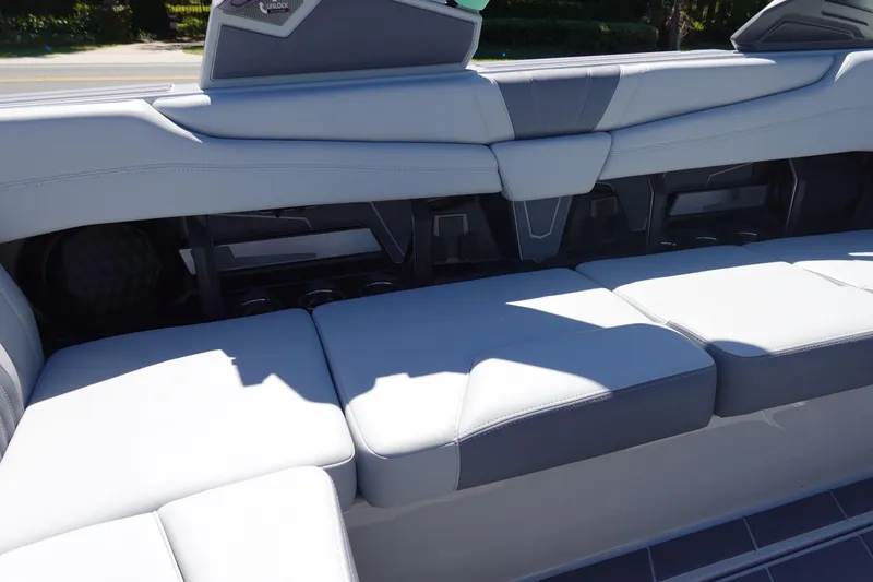 Slide: The Image of 2026 Malibu Wakesetter 22 LSV interior seating with sleek, modern design and ample storage. - 18