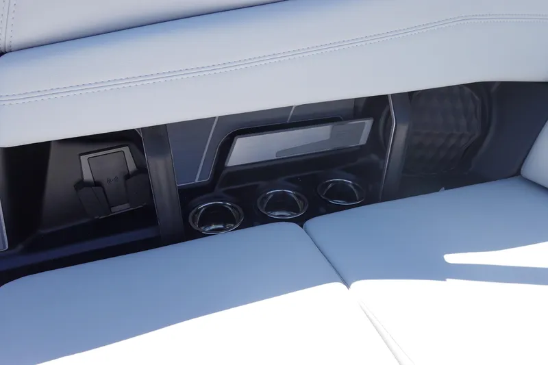 Slide: The Image of Interior of 2026 Malibu Wakesetter 22 LSV with cup holders and sleek seating. - 21