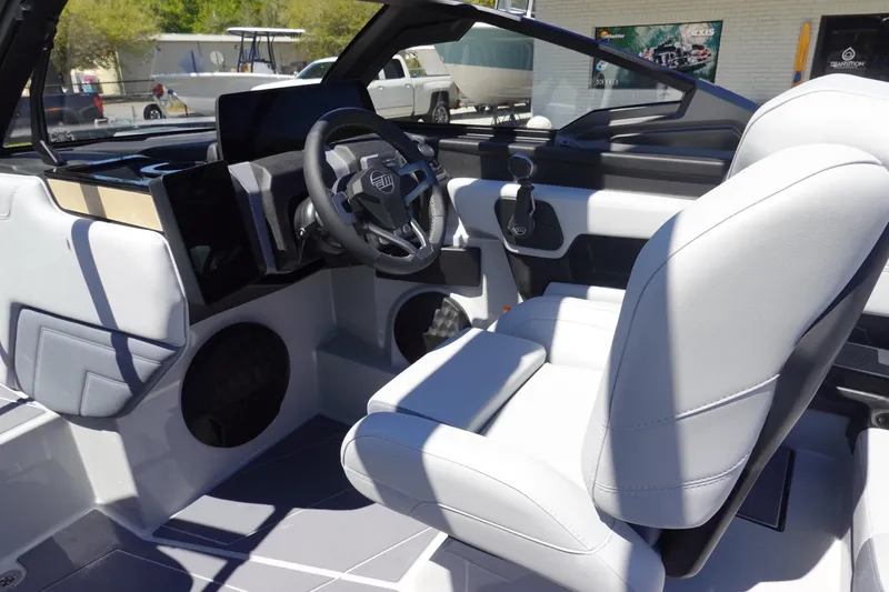 Slide: The Image of Interior of 2026 Malibu Wakesetter 22 LSV with modern helm. - 24