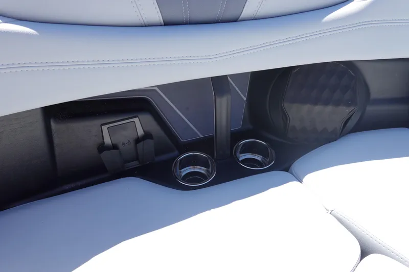 Slide: The Image of 2026 Malibu Wakesetter 22 LSV interior with cup holders and speaker detail. - 34
