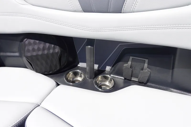 Slide: The Image of 2026 Malibu Wakesetter 22 LSV interior with cup holders and phone holder. - 35