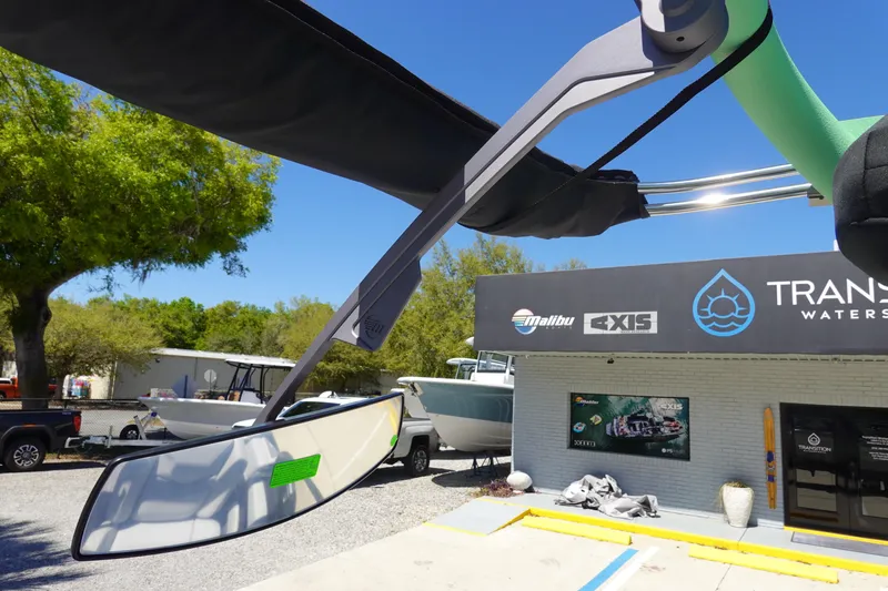 Slide: The Image of 2026 Malibu Wakesetter 22 LSV at Transition Watersports dealership, sunny day. - 40