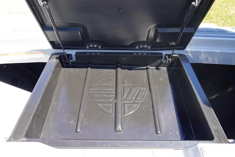 Slide: The Image of Open storage compartment of 2026 Malibu Wakesetter 22 LSV boat. - 42