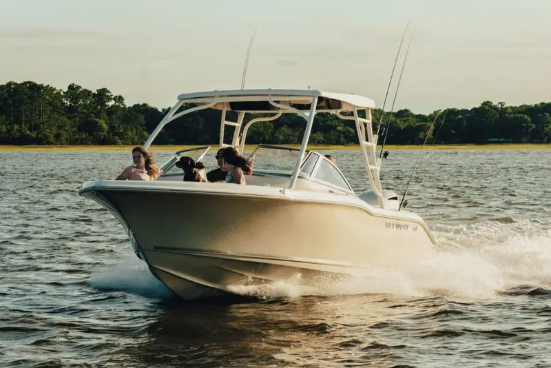 Slide: The Image of 2024 Key West 239 DFS boat interior with seating and storage compartments. - 5