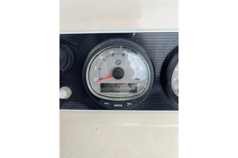 Slide: The Image of Close-up of 2018 Boston Whaler 210 Dauntless boat tachometer displaying system fault. - 11
