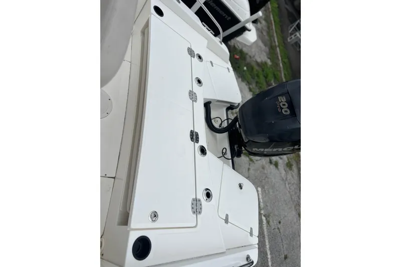 Slide: The Image of 2018 Boston Whaler 210 Dauntless boat with Mercury 200 Pro outboard motor. - 12