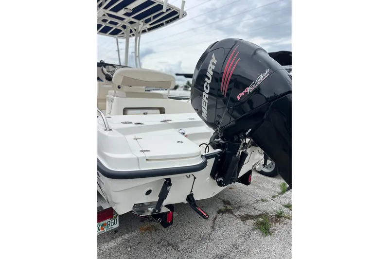 Slide: The Image of 2018 Boston Whaler 210 Dauntless boat with Mercury Pro XS outboard motor. - 5