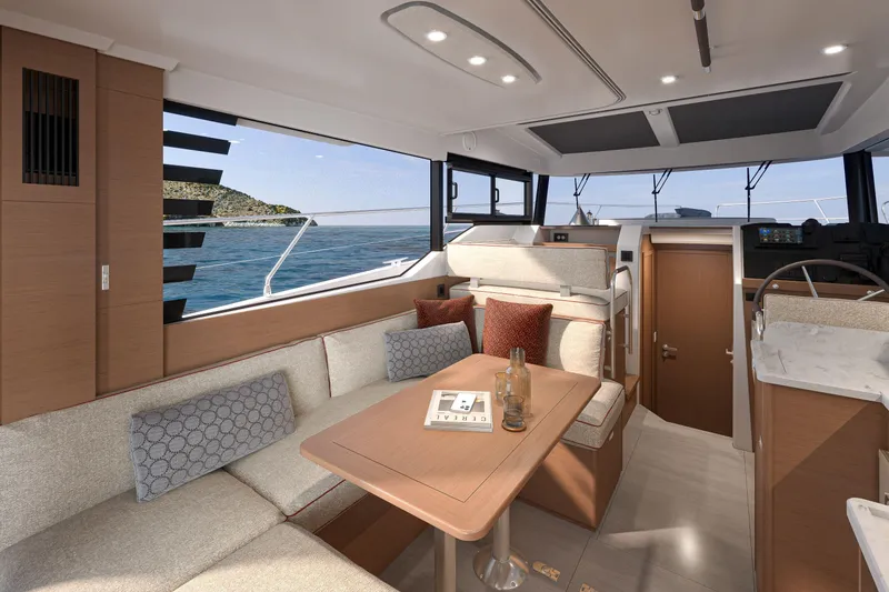 Slide: The Image of Interior of 2026 Beneteau Swift Trawler 37 Sedan, featuring modern seating and ocean view. - 8