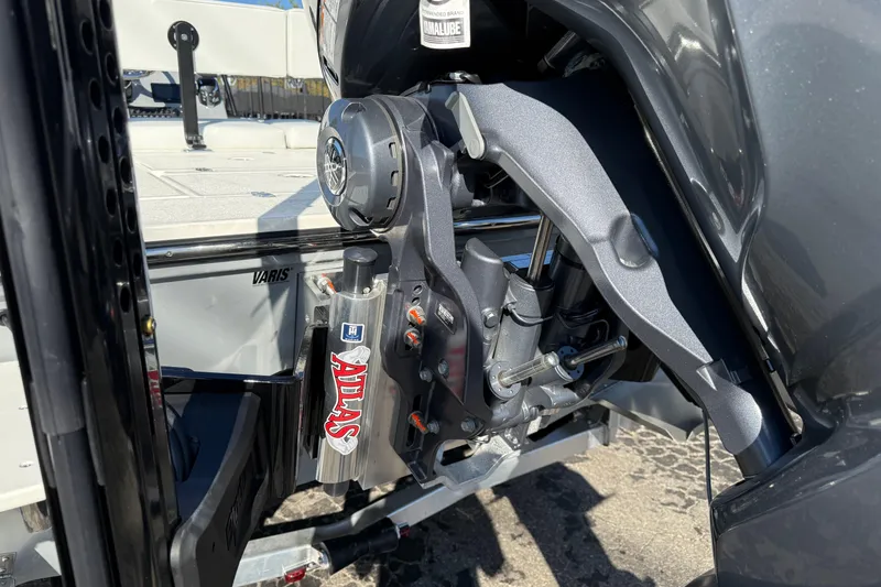 Slide: The Image of 2026 Hewes Redfisher 21 boat engine detail with Atlas hydraulic jack plate. - 4