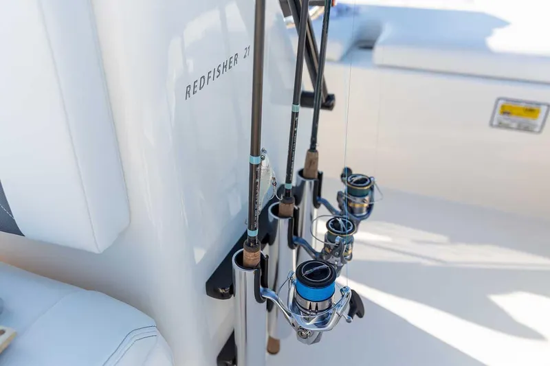 Slide: The Image of Manufacturer Provided Image: 2026 Hewes Redfisher 21 boat with fishing rods secured on deck. - 52
