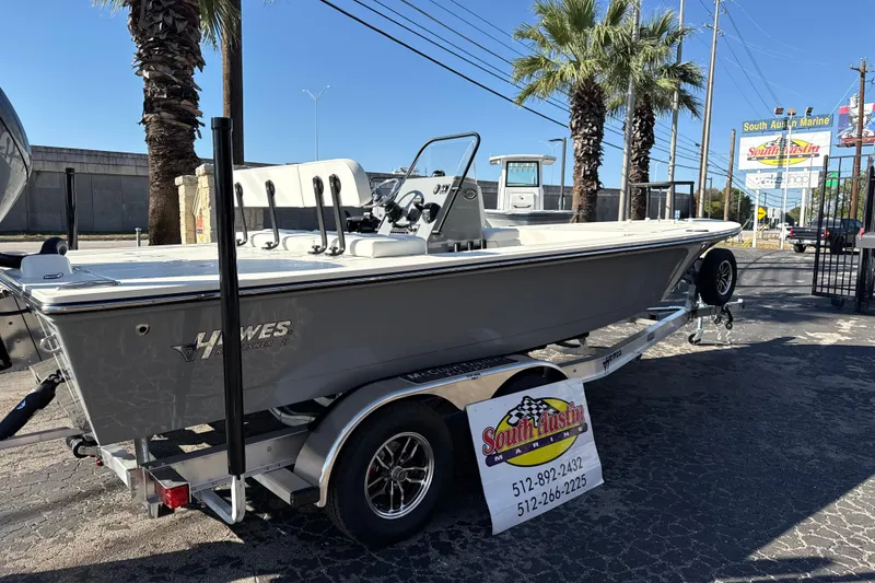 Slide: The Image of 2026 Hewes Redfisher 21 boat on trailer at South Austin Marine dealership. - 59
