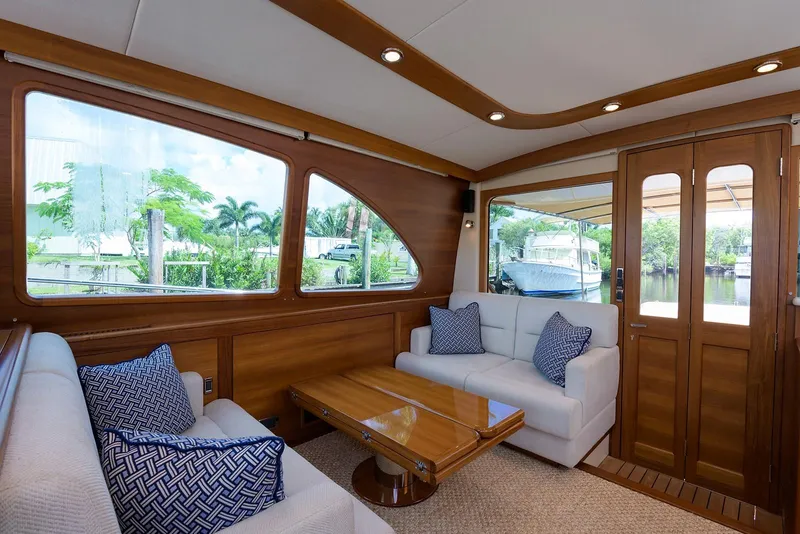 Slide: The Image of 2018 Palm Beach Motor Yachts PB55 interior storage compartment with wooden flooring and equipment. - 29