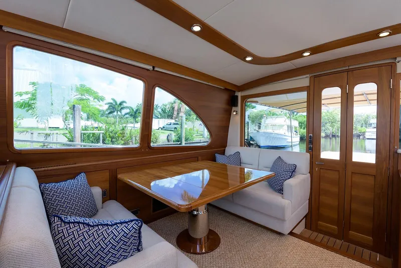 Slide: The Image of Luxurious interior of 2018 Palm Beach Motor Yachts PB55 with wooden cabinetry and modern design. - 30