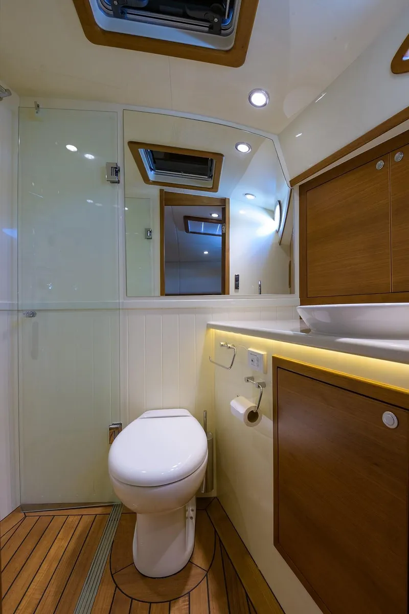 Slide: The Image of Luxurious bathroom interior of 2018 Palm Beach Motor Yachts PB55, featuring elegant wood finishes. - 47