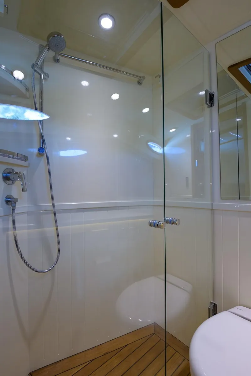 Slide: The Image of Engine room of 2018 Palm Beach Motor Yachts PB55, showcasing mechanical components and systems. - 49