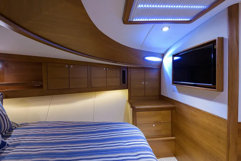 Slide: The Image of 2018 Palm Beach Motor Yachts PB55 cruising on open water. - 52