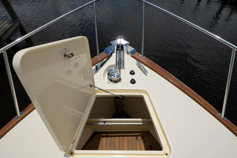 Slide: The Image of Luxurious interior of 2018 Palm Beach Motor Yachts PB55 with elegant wood finishes and plush seating. - 22