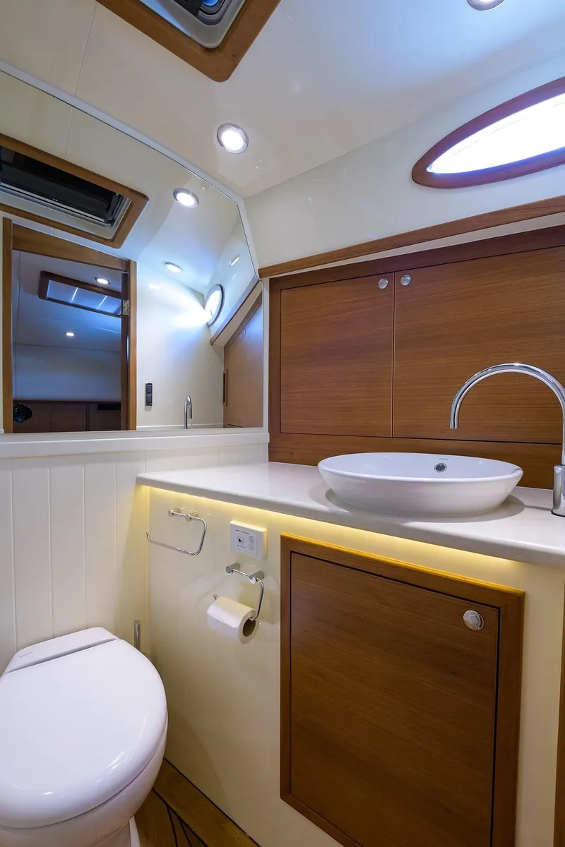 Slide: The Image of Luxurious bathroom in 2018 Palm Beach Motor Yachts PB55, featuring modern fixtures and elegant design. - 46