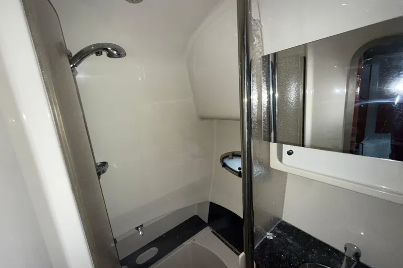 Slide: The Image of Bathroom interior of 2006 Formula 40 Performance Cruiser with shower and mirror. - 12