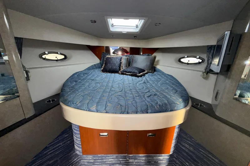 Slide: The Image of Interior cabin of 2006 Formula 40 Performance Cruiser with cozy bed and porthole windows. - 17